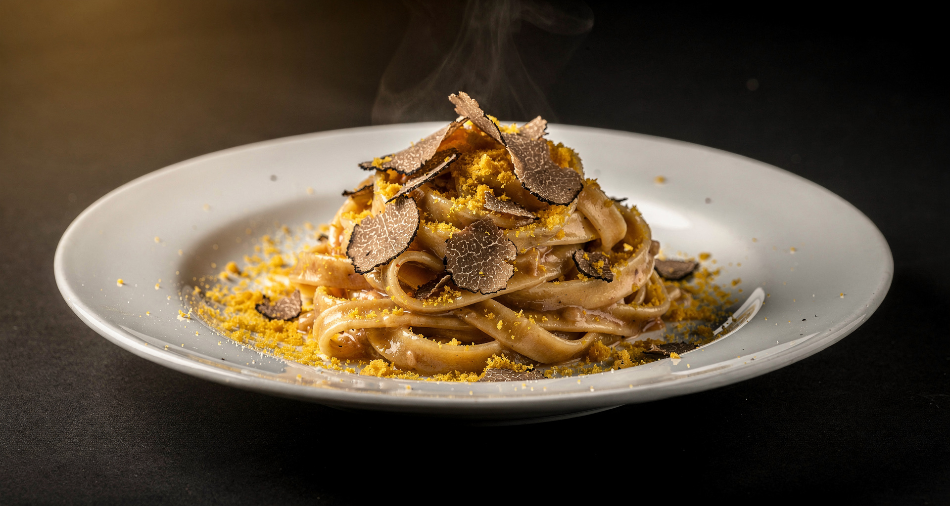 Handmade tagliatelle with shaved truffles and mushrooms